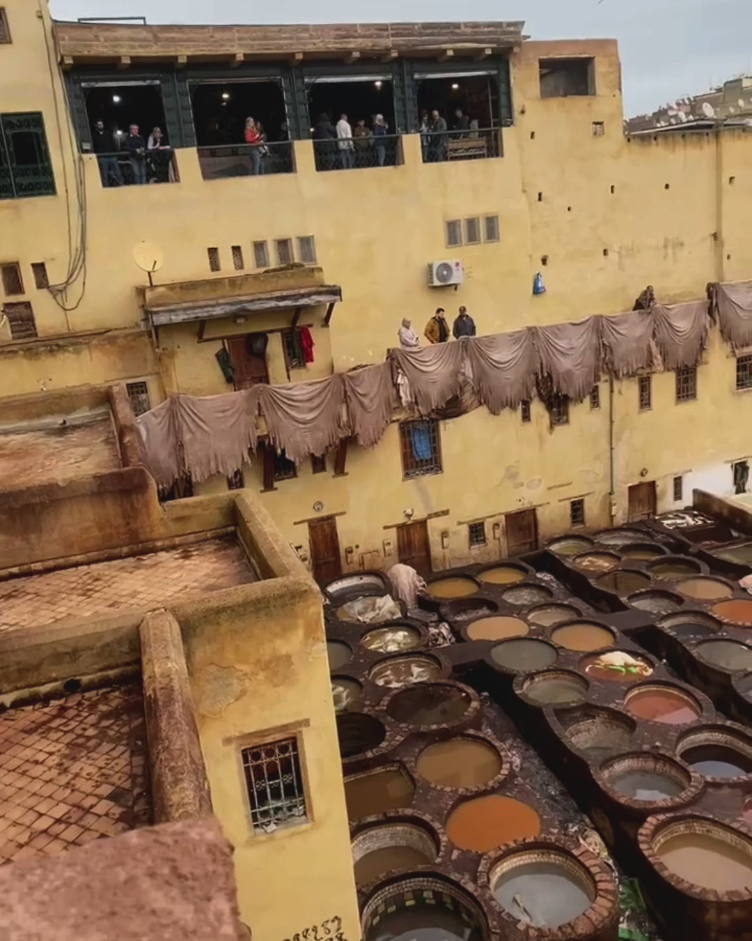Load video: Moroccan Tannery Process.